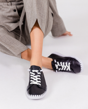 Turnschuhe fließen 004 schwarz